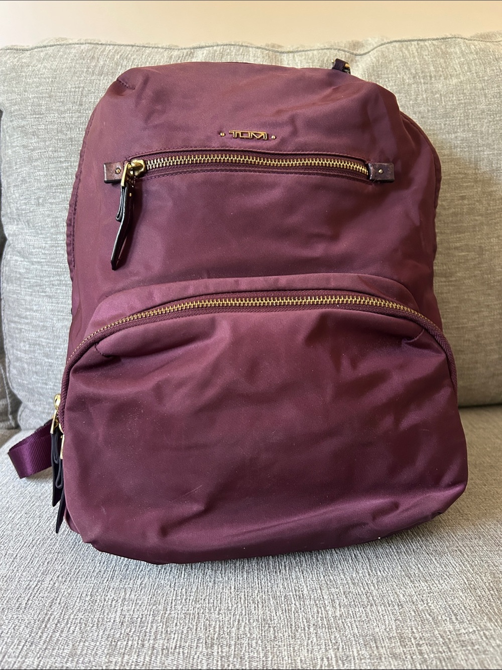 Tumi Burgundy Backpack with Gold Hardware